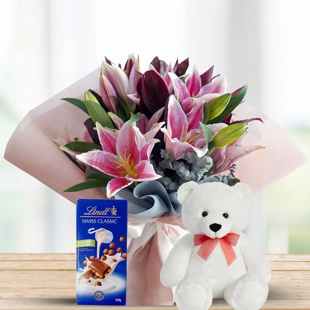 Pink Lilies with Foliage, Lindt & Teddy By Flower Delivery Dubai for Birthday