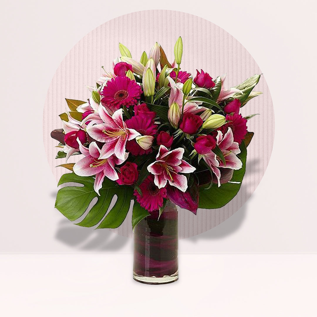 Stargazer Lily & Dark Pink Gerberas By Flower Delivery Dubai for illness