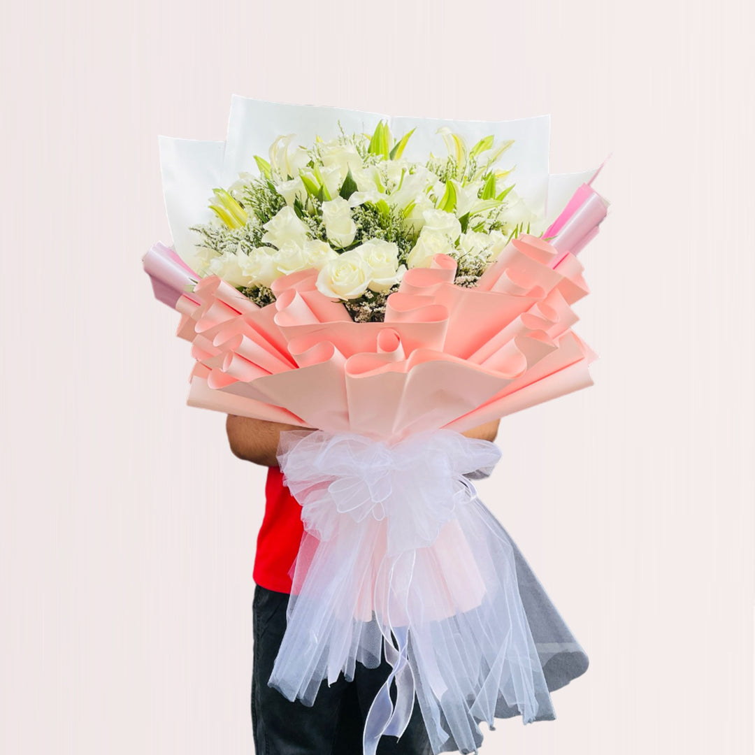 20 Roses & 7 Lilies with Caspia By Flower Delivery Dubai for Congratulations