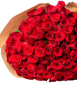 Close-up detail of two hundred red roses in craft paper