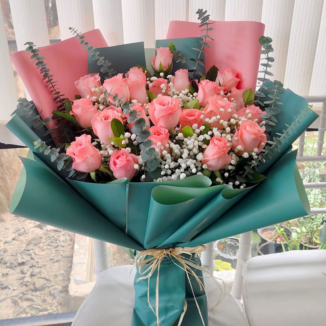 24 Coral Pink Roses Bouquet By Flower Delivery Dubai for Valentines Day