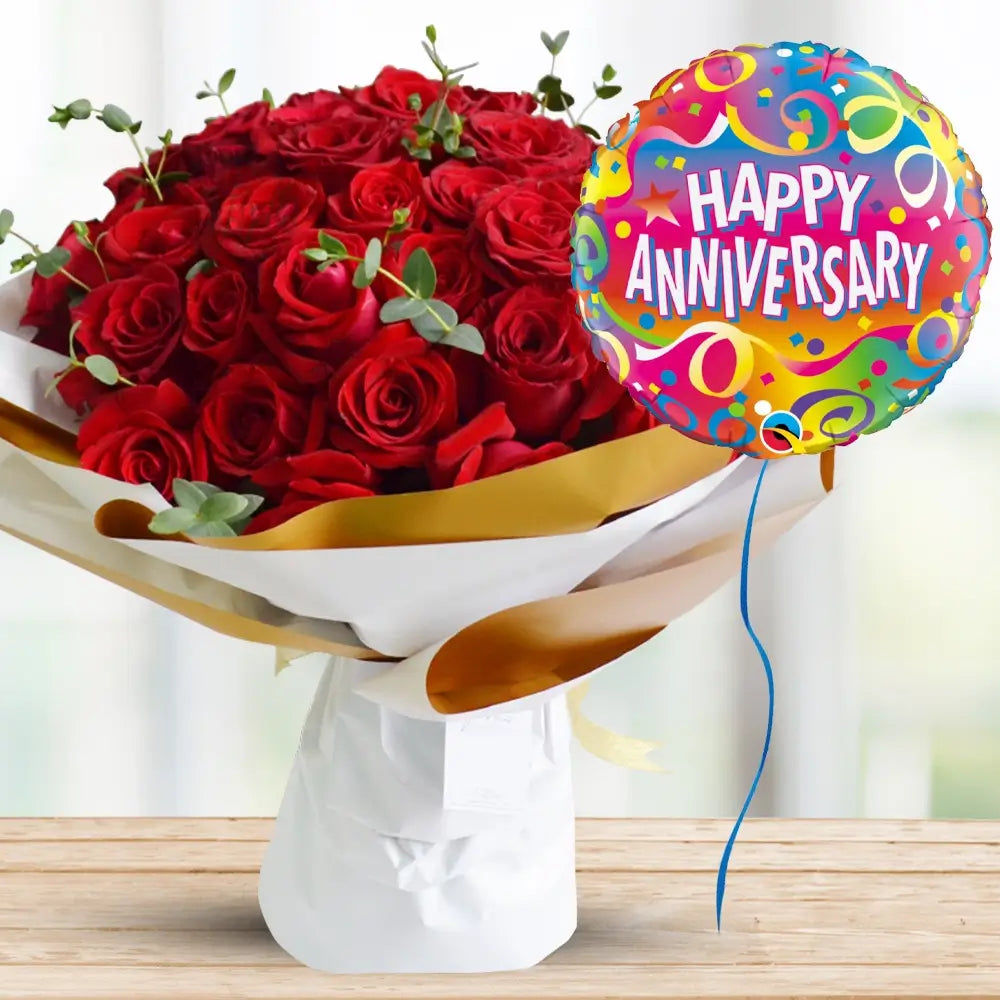 25 Red Roses with Eucalyptus & Anniversary Balloon By Flower Delivery Dubai for Congratulations