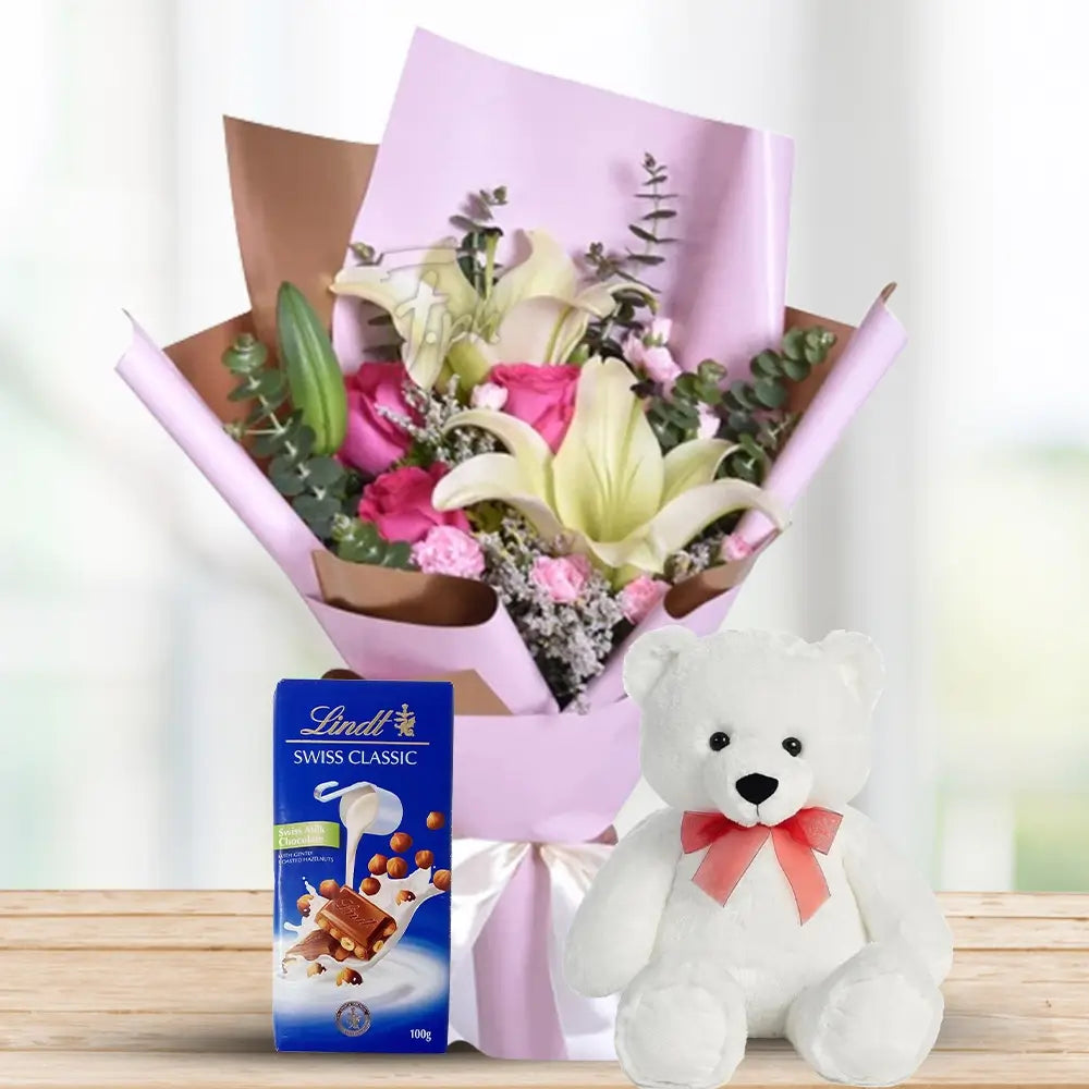 Baby’s Breath, Pink Roses, Lilies & Carnations with Lindt & Teddy By Flower Delivery Dubai for her