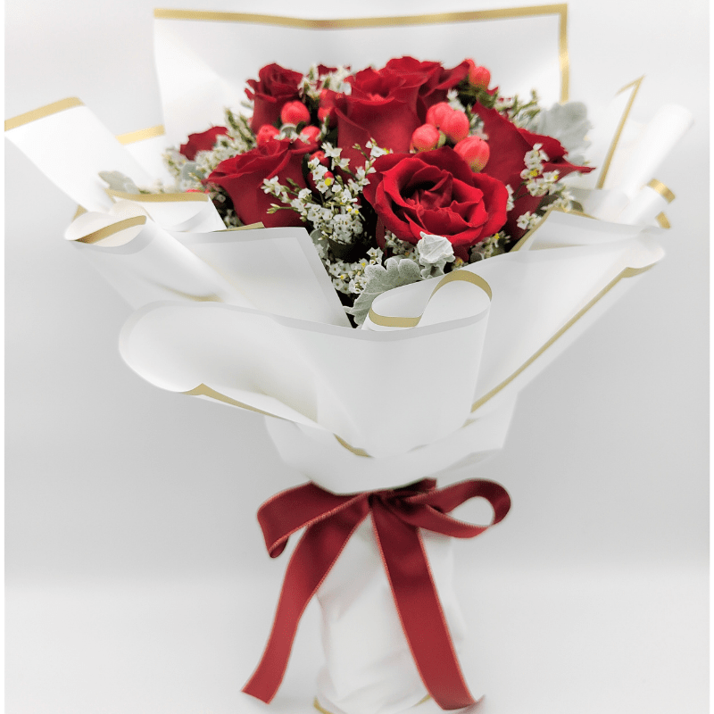 Red Rose, Silver Leaf & Red Berry Bouquet By Flower Delivery Dubai for Friendship