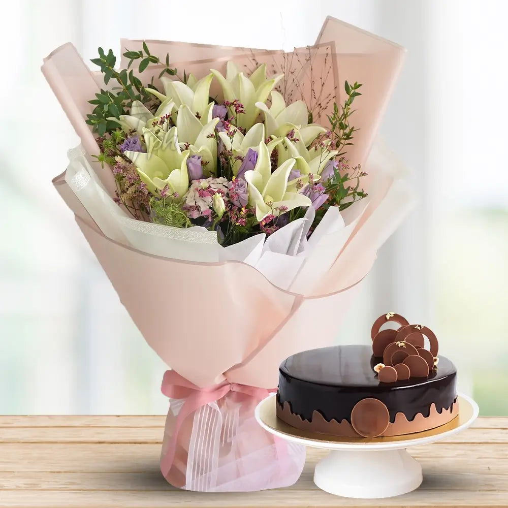 White Lilies with Fillers & 1 Kg Chocolate Cake By Flower Delivery Dubai for Valentines Day