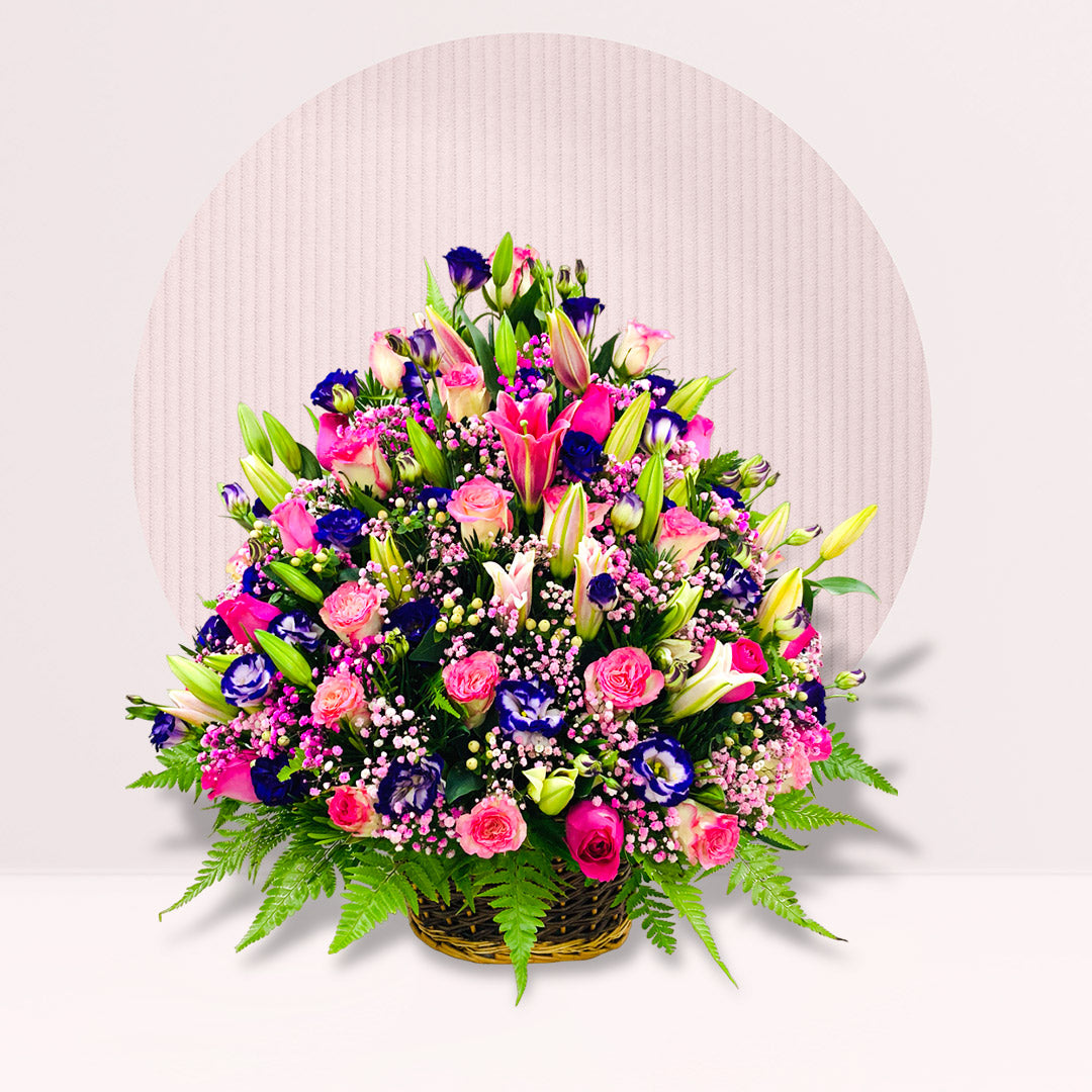 Basket with Roses, Lilies & Baby’s Breath By Flower Delivery Dubai for Congratulations