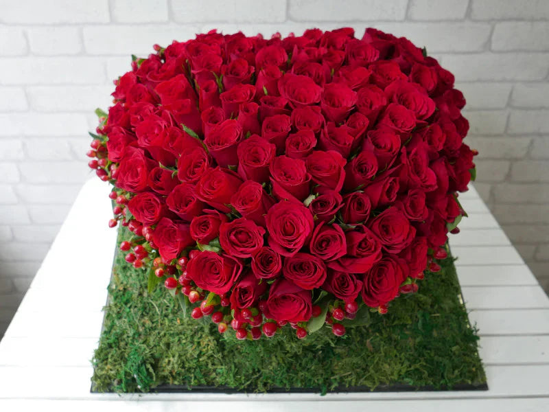 Heart Shaped 99 Red Roses with Hypericum By Flower Delivery Dubai for Birthday