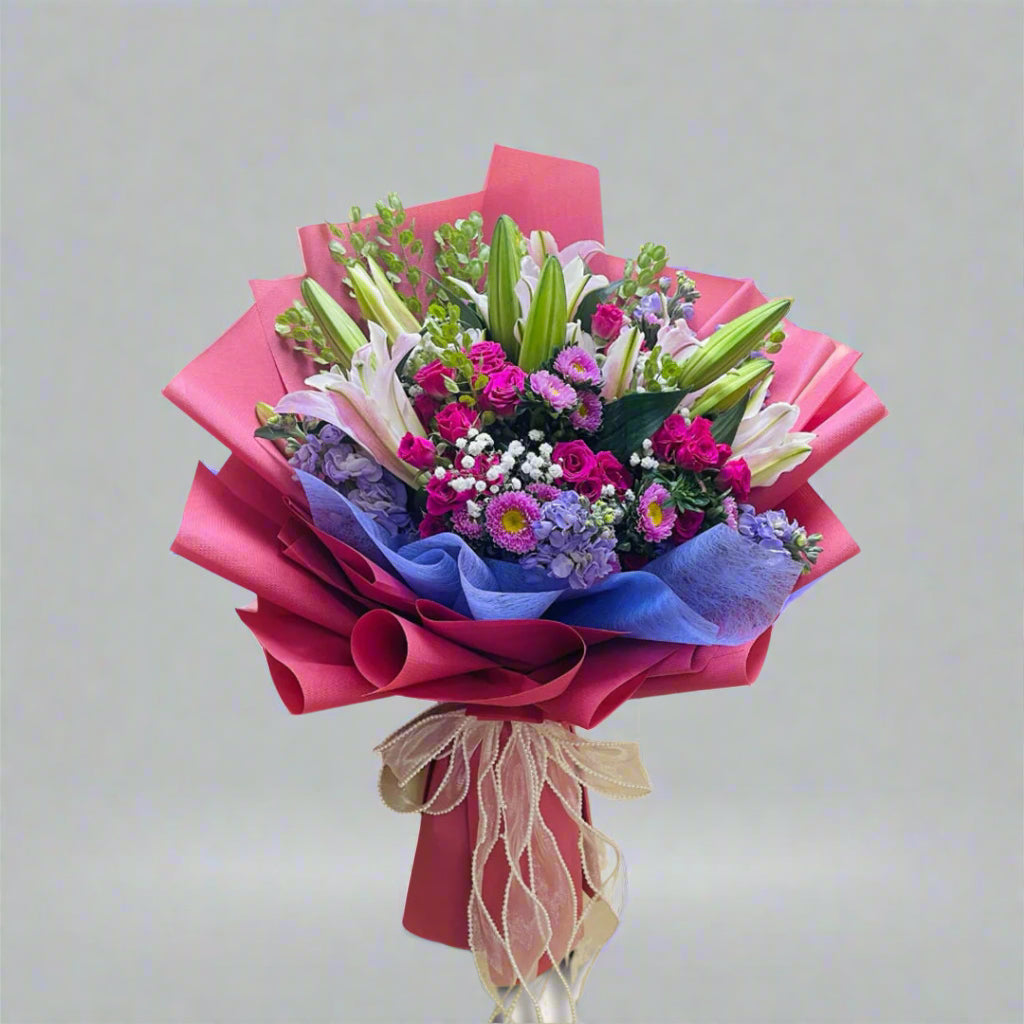 Lilies, Spray Roses & Seasonal Greens — fresh flowers, same day delivery in Dubai