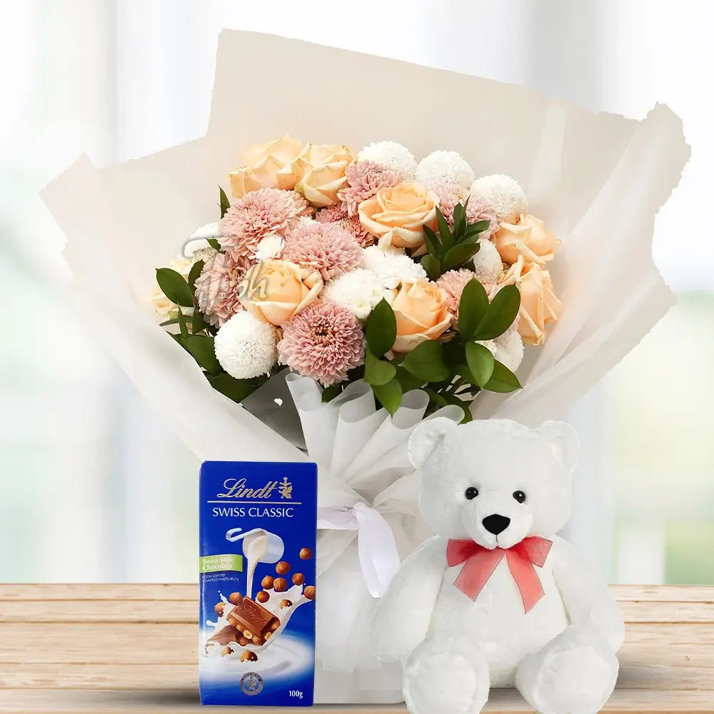 Peach Roses, Chrysanthemums & Pompom with Lindt & Teddy By Flower Delivery Dubai for him