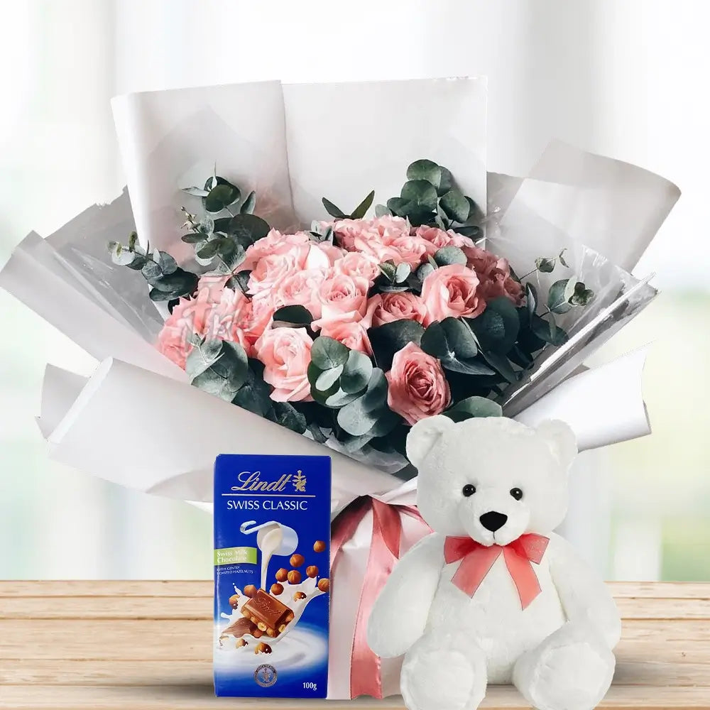 Peach Roses with Eucalyptus, Lindt & Teddy By Flower Delivery Dubai for Congratulations