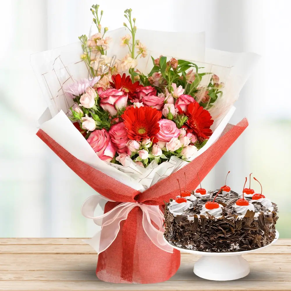 Pink Roses, Gerbera & Alstroemeria with Black Forest Cake By Flower Delivery Dubai for Congratulations