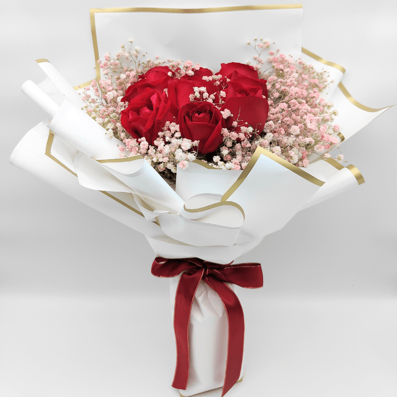 Red Roses with Spray Pink Baby’s Breath By Flower Delivery Dubai for illness