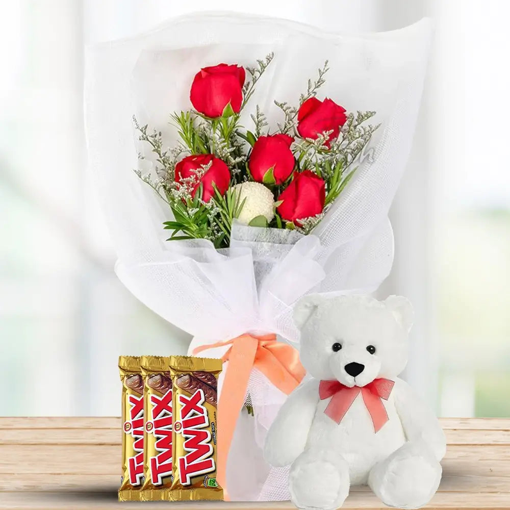 Red Roses, White Ping Pong & Caspia with Maltesers By Flower Delivery Dubai for Friendship