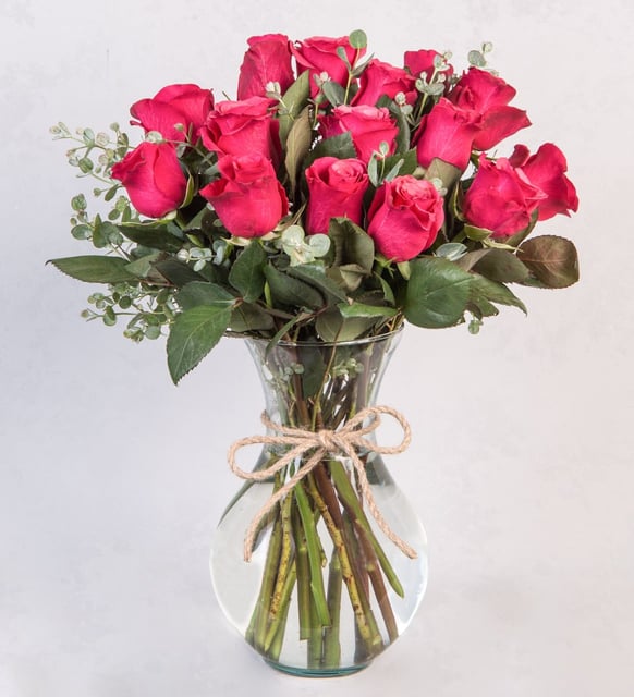 Rosa Fuscia with 16 Pieces By Flower Delivery Dubai for him