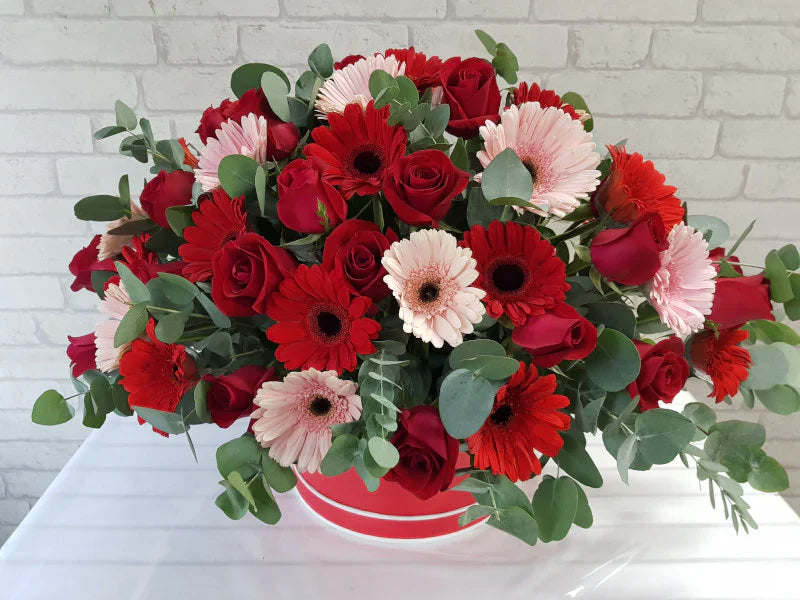 Roses, Gerberas & Eucalyptus Leaves By Flower Delivery Dubai for Friendship