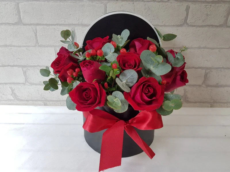 Roses, Red Berries & Eucalyptus By Flower Delivery Dubai for Birthday