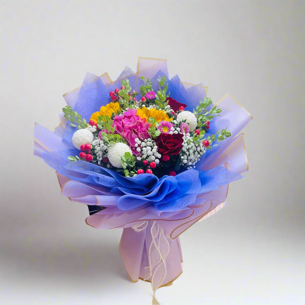 Sunflowers, Roses & Seasonal Greens — fresh flowers, same day delivery in Dubai
