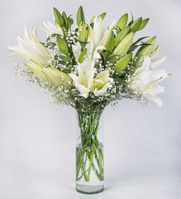 White Lilies in Glass Vase — fresh flowers, same day delivery in Dubai